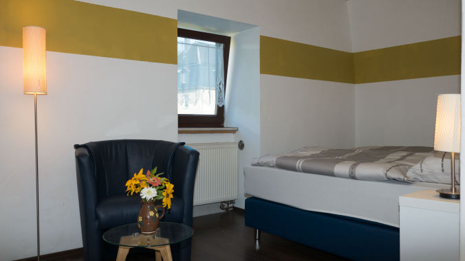 Haus Ilse Schlafzimmer Ferienwohnung Bad Schlema